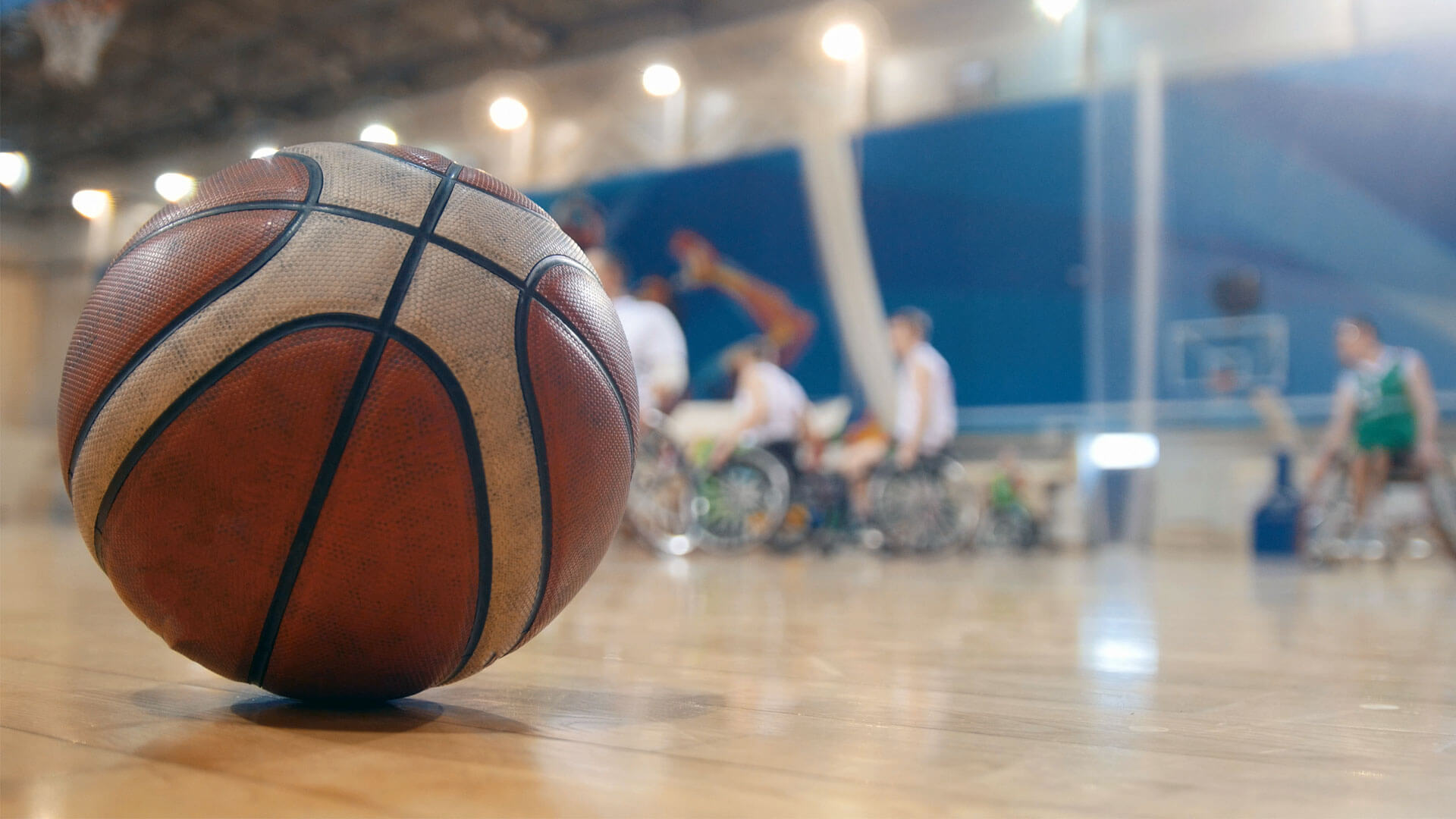 Close-up of a basketball on a basketball court.